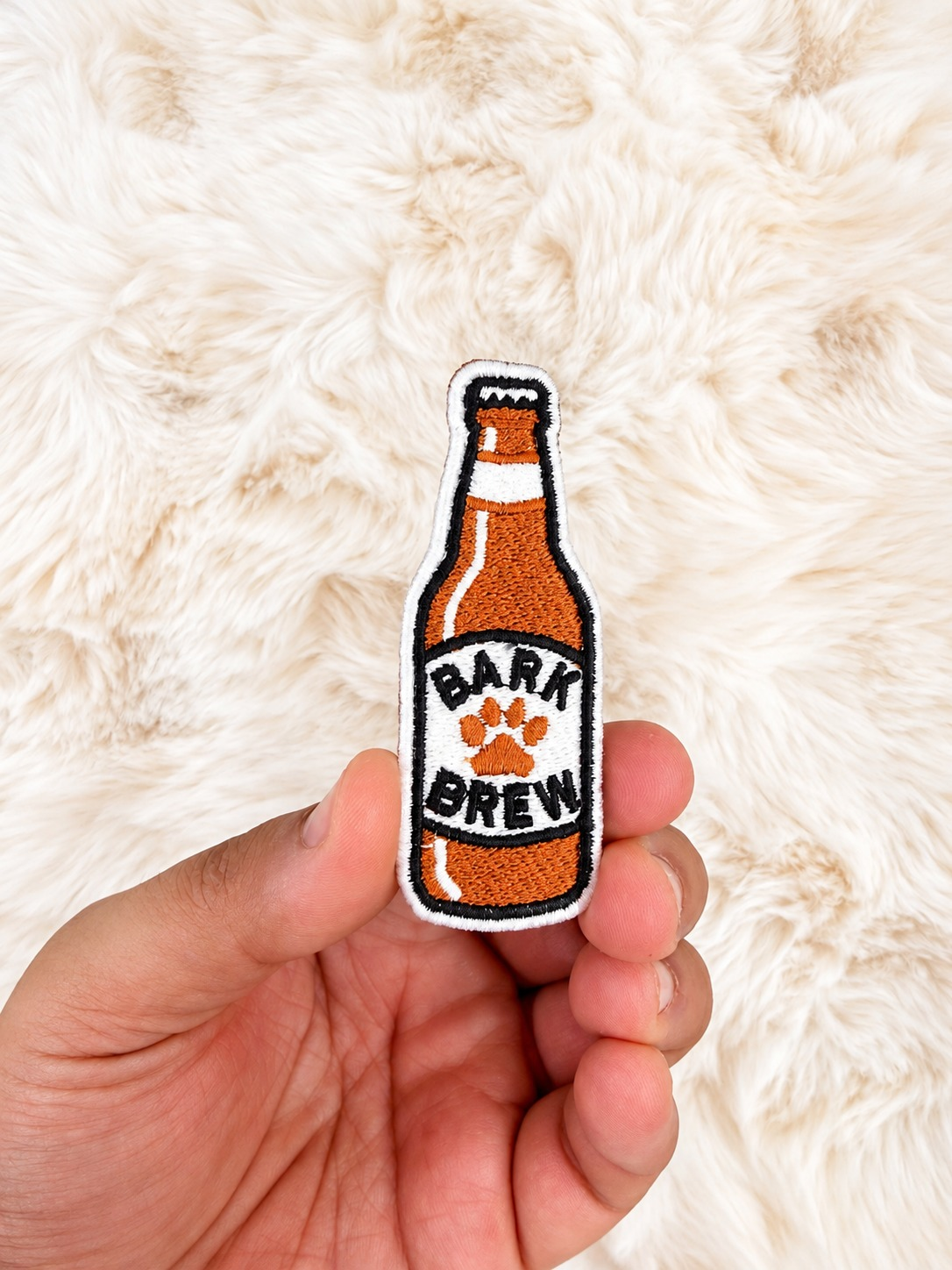 Beer velcro patch, in hand